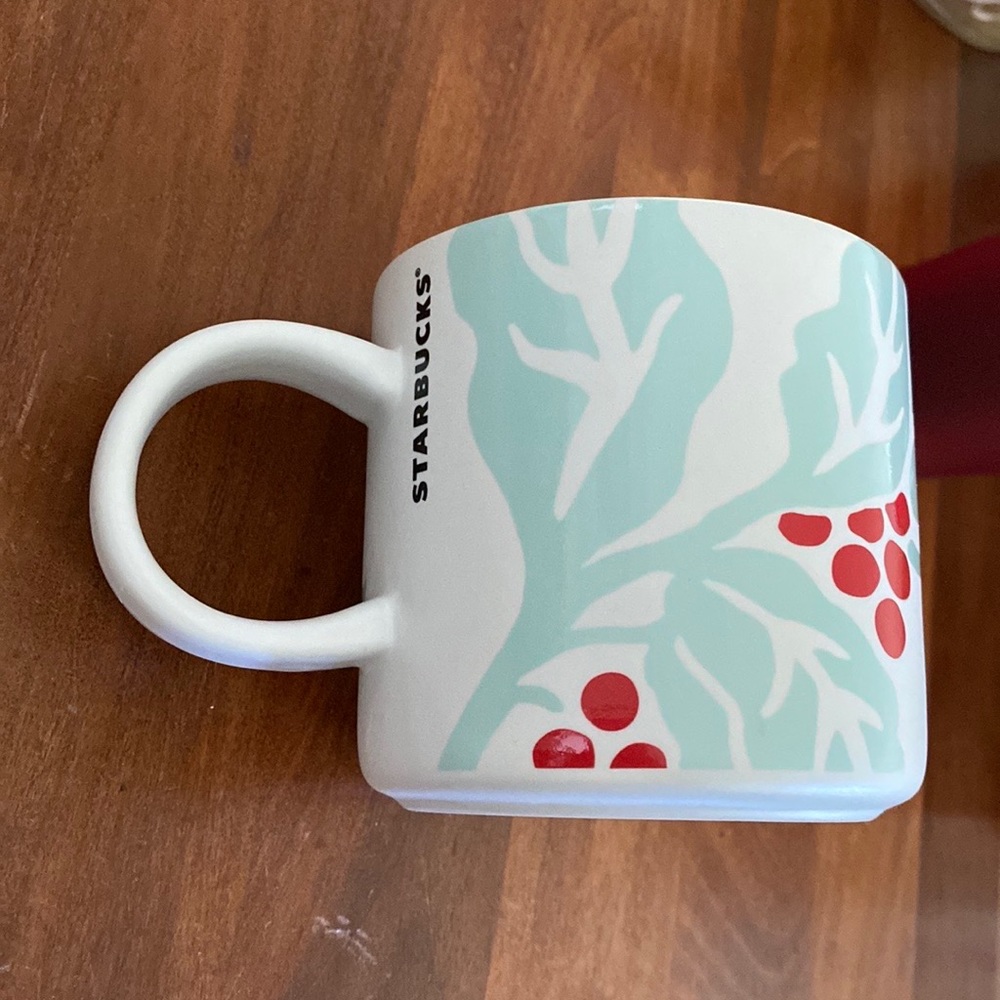 Lightly used Starbucks holiday coffee mug!